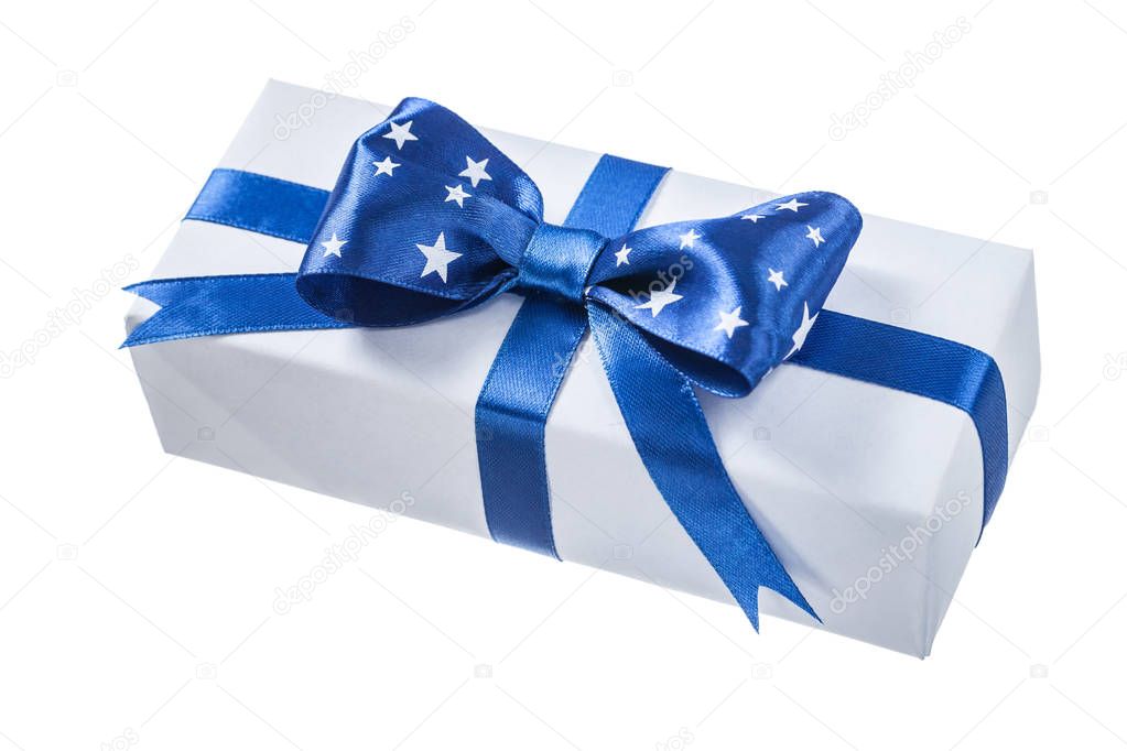 Wrapped white present box with blue ribbon isolated on white