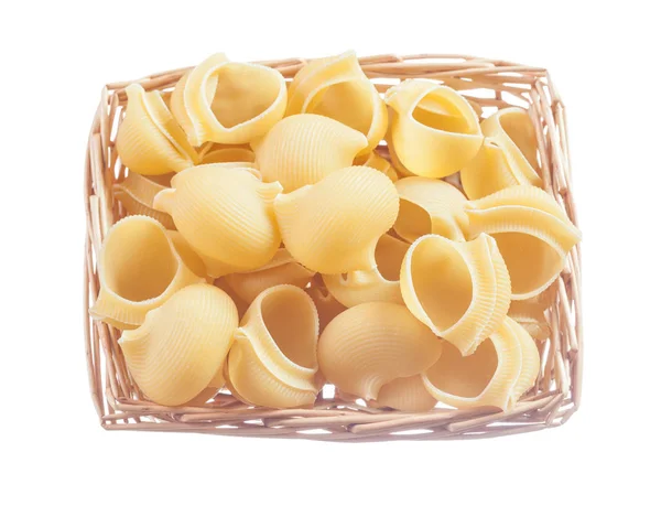 Basket of pasta shells isolated on white — Stock Photo, Image