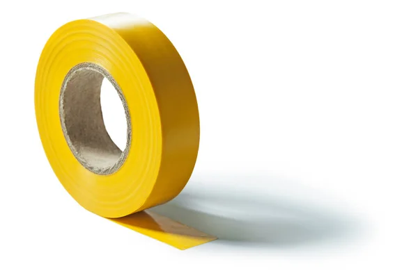Изолированный желтый рулон изоляционной ленты — стоковое фото
