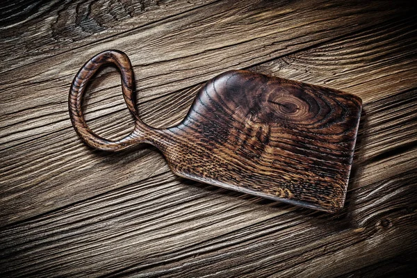 Dark vintage wood chopping board — Stock Photo, Image