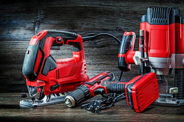 Utensili elettrici a mano filo rosso puzzle trapano cordless e piccolo p — Foto Stock