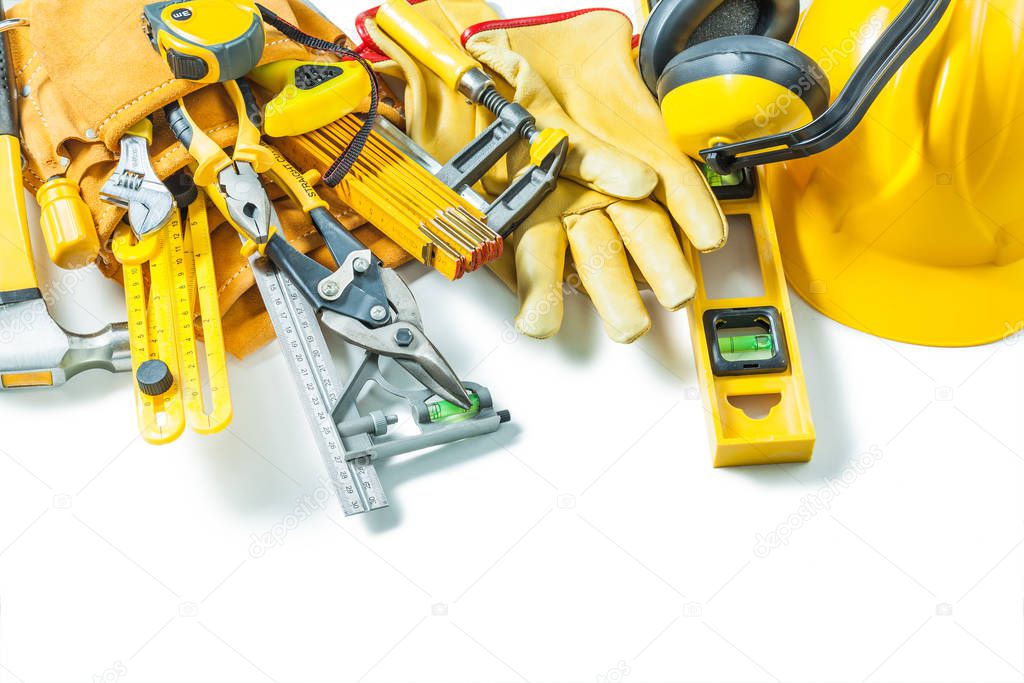 close up view on big set of construction tools isolated on white