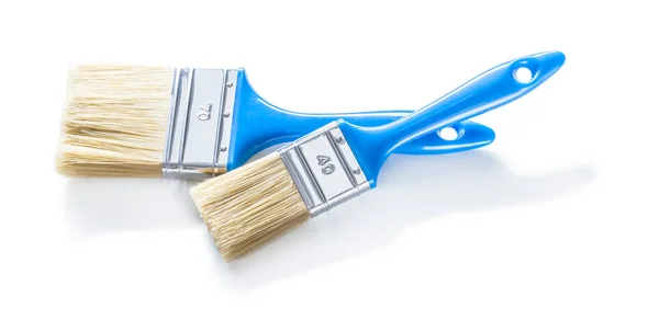 Two blue paint brushes isolated on white background — Stock Photo, Image