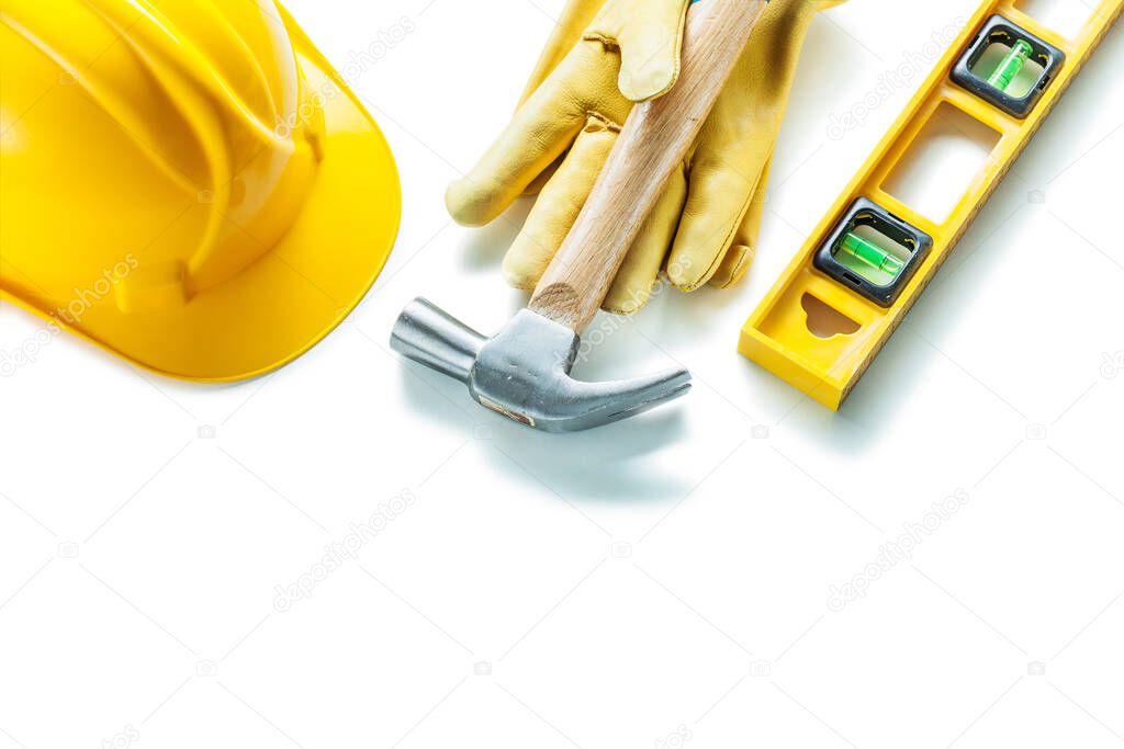 construction tools isolated on white level hammer gloves helmet
