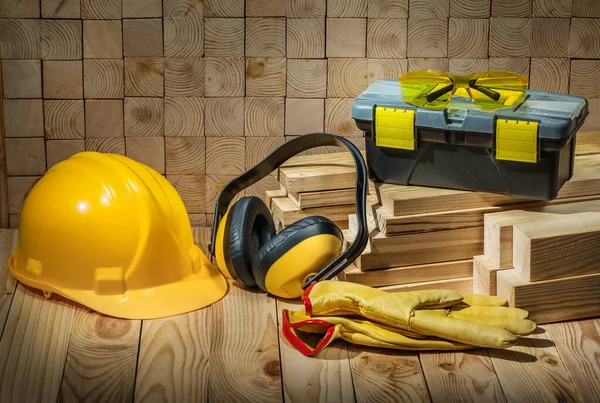 Construction Tools Helmet Gloves Goggles Earphones Toolbox Wooden Background — Stock Photo, Image