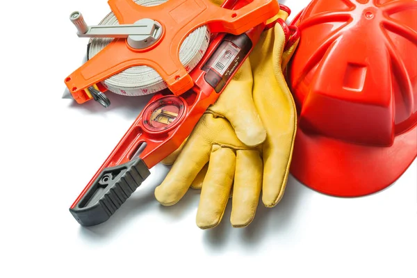 Isolierte Bauwerkzeuge Roter Helm Handschuhe Ebnen Großes Maßband — Stockfoto