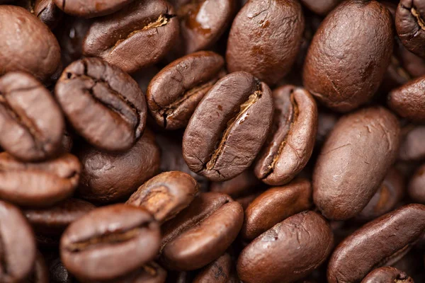 Kaffebönor makro som bakgrund — Stockfoto