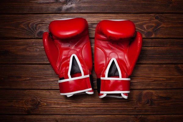 Red Boxing Gloves Wooden Background — Stock Photo, Image