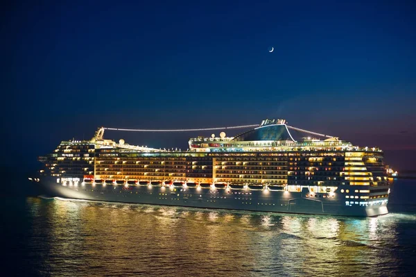 Cruise liner and new moon — Stock Photo, Image