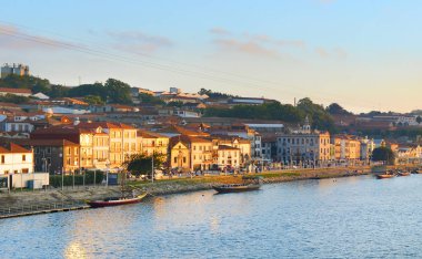 View Villa Nova de Gaia, Douro river at sunset. Portugal clipart