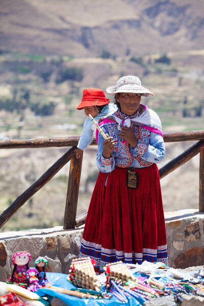 Unidentified woman selling souvenirs