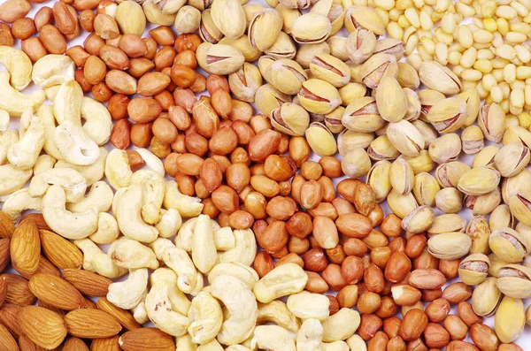 Peanuts, hazelnuts, cashews, pistachio — Stock Photo, Image