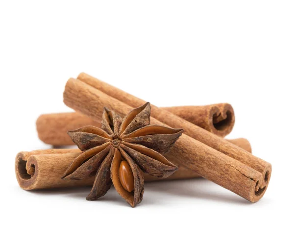 Anise and cinnamon on white — Stock Photo, Image