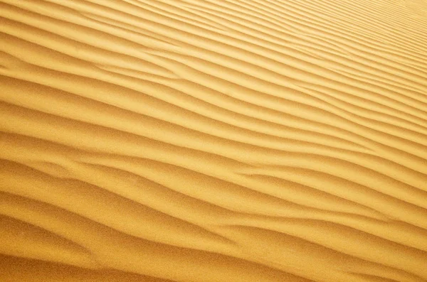 Желтый песок — стоковое фото