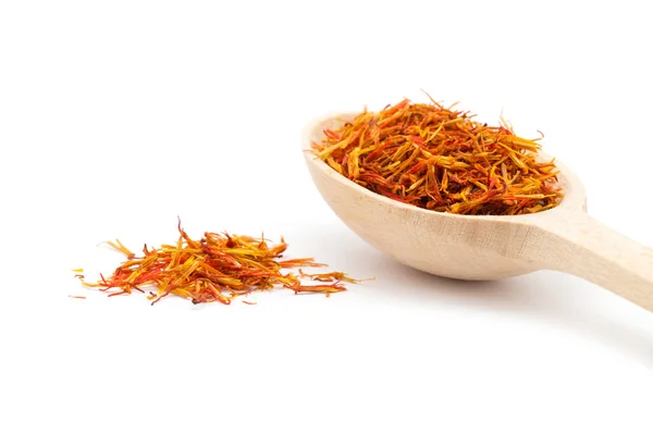 Saffron spice in wooden spoon — Stock Photo, Image