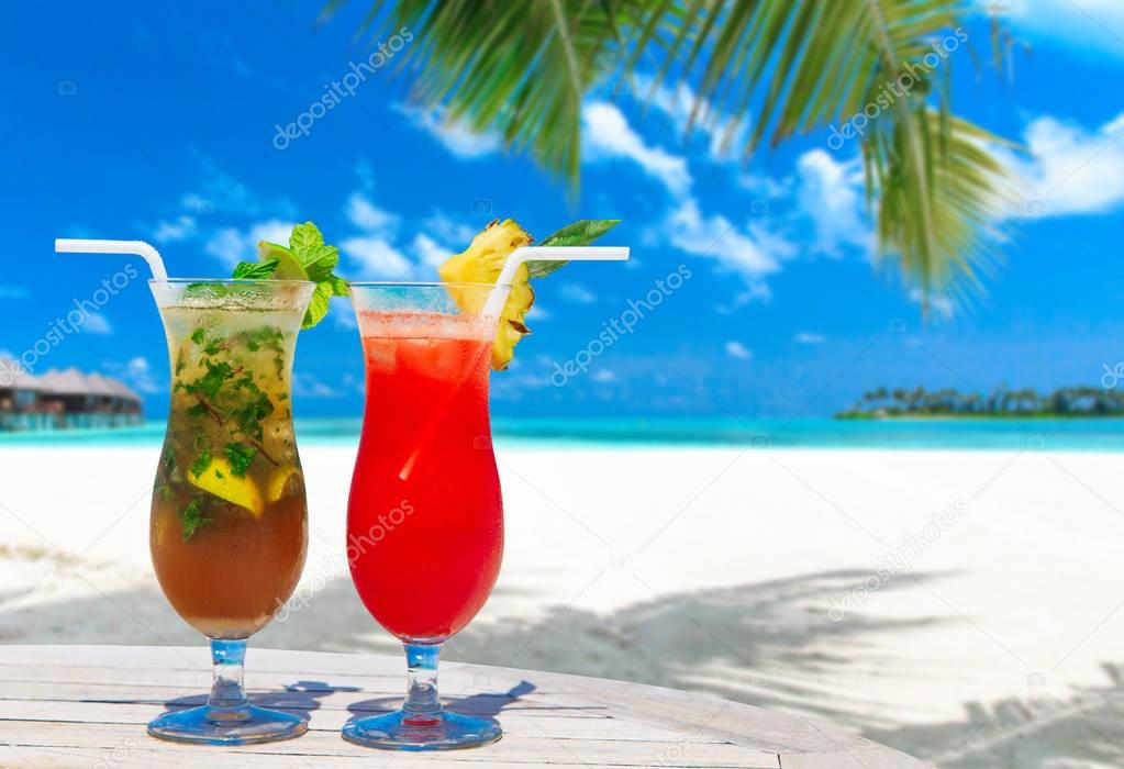 two cocktails with blur beach 