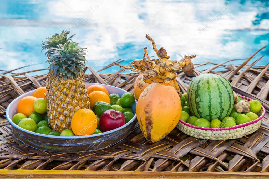 Fresh Fruits on the beach at a deck — Stock Photo © Pakhnyushchyy