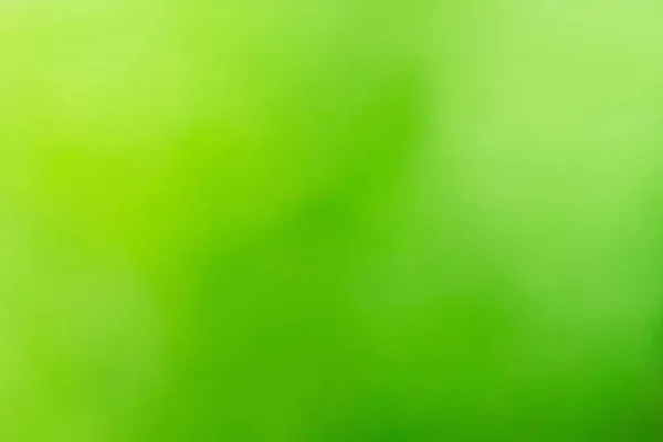Zelená tráva rozmazané šablona — Stock fotografie