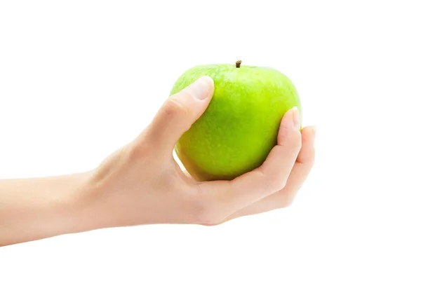 Female hand holding green apple — Stock Photo, Image