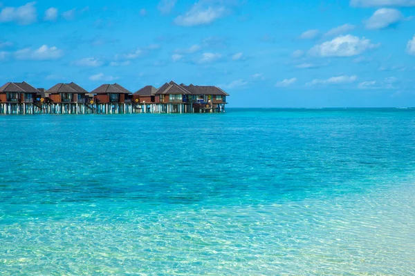 Beach with water bungalows — Stock Photo, Image