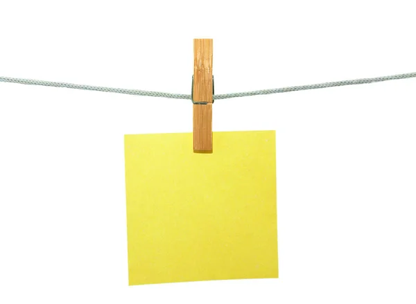 Sheet hanging on clothes peg — Stock Photo, Image