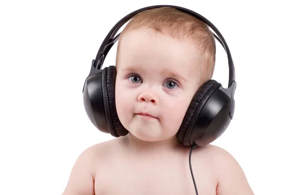 Smiling baby with headphones — Stock Photo, Image