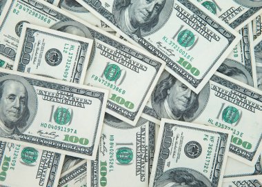 Yığınla Amerikan doları.