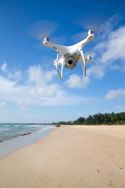 drone flying over sea.