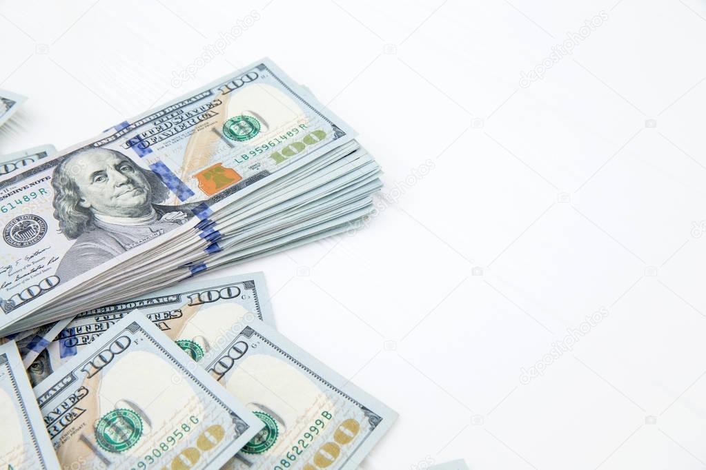 Stack of american dollars on white background