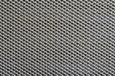 arka plan sayfası dairesel delikli çizgilerle kaplanmış metal