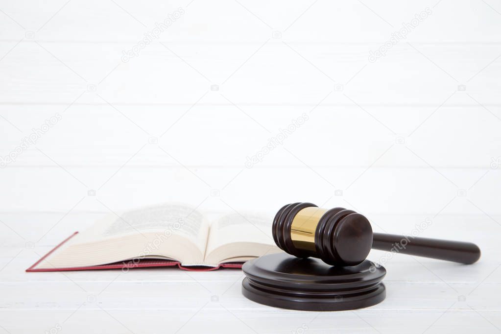 wooden gavel and book