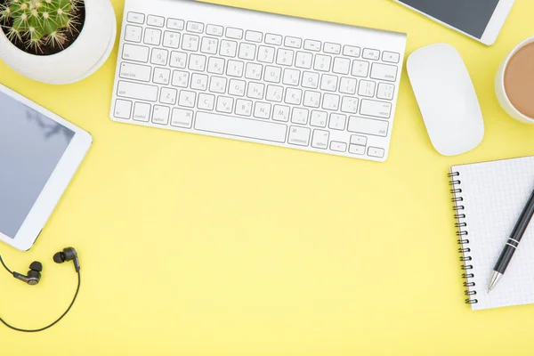 Workspace Tablet Keyboard Coffee Cup Eyeglasses Copy Space Yelow Background — Stock Photo, Image