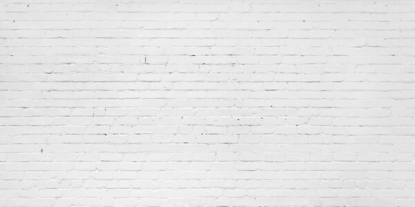 Белая кирпичная стена для фона или текстуры