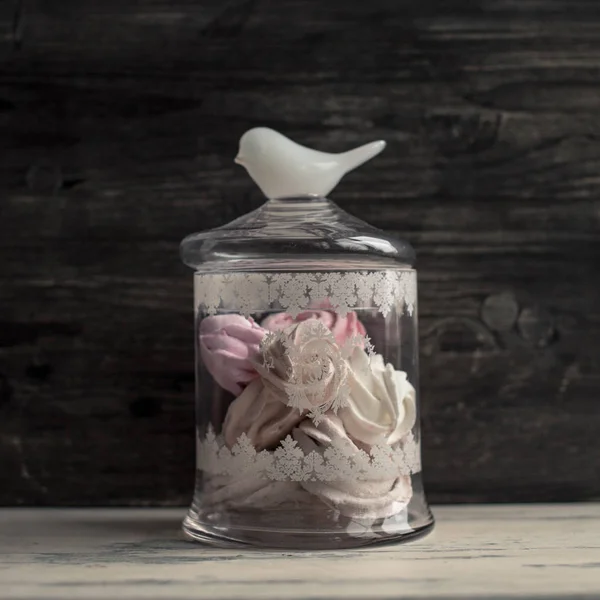 Vintage jar of marshmallow on a gray background Royalty Free Stock Images