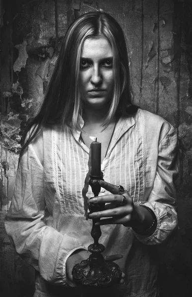 Phantom girl with candle — Stock Photo, Image