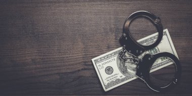 Kelepçe ve yüz dolar arka plan