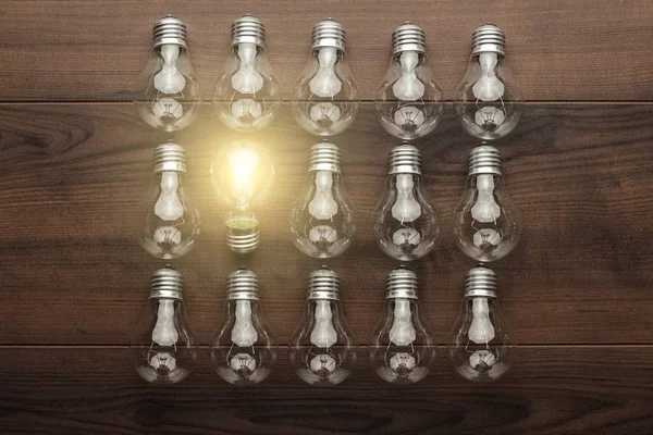 Ampoule lumineuse concept d'unicité — Photo