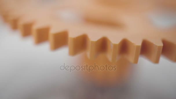 Orange plast roterande kugghjul — Stockvideo