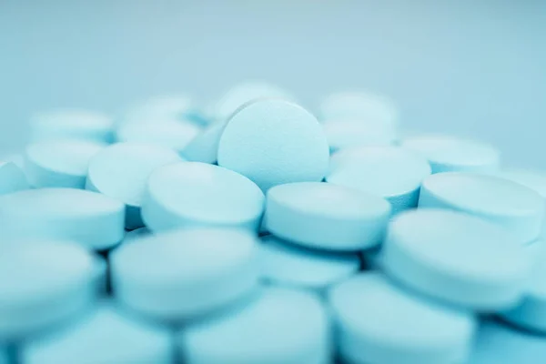 Pile of blue pills close-up — Stock Photo, Image