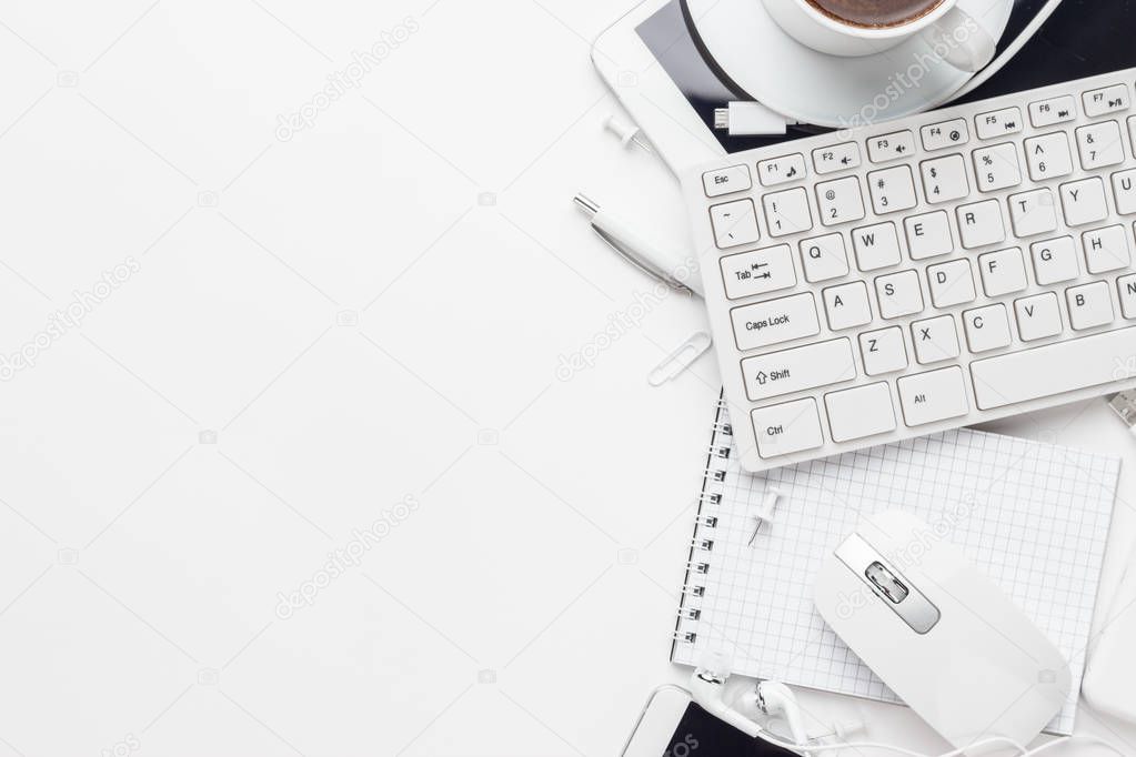 overhead of white office table with copy space