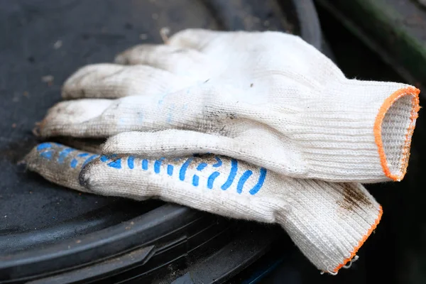 image of dirty working gloves