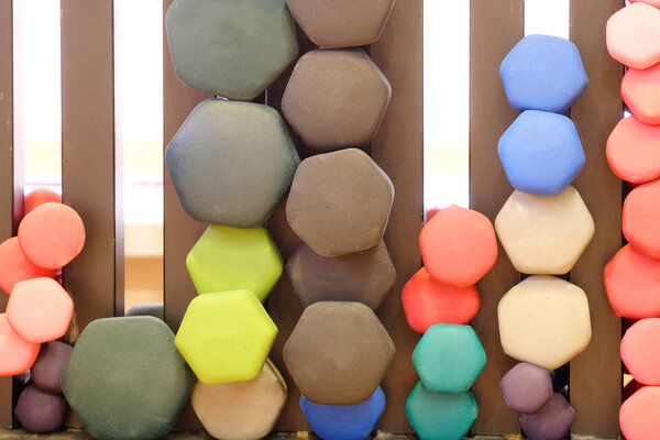 dumbbells on a stand in a fitness hall