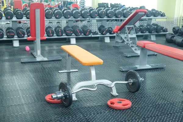 Dumbbells in a fitness hall — Stock Photo, Image