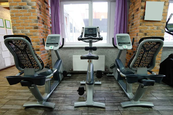 Fitness bikes in a fitness hall — Stock Photo, Image