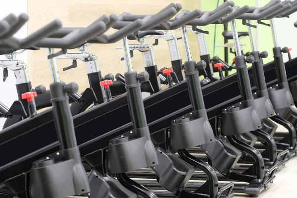 Fitness hall with sport bikes — Stock Photo, Image