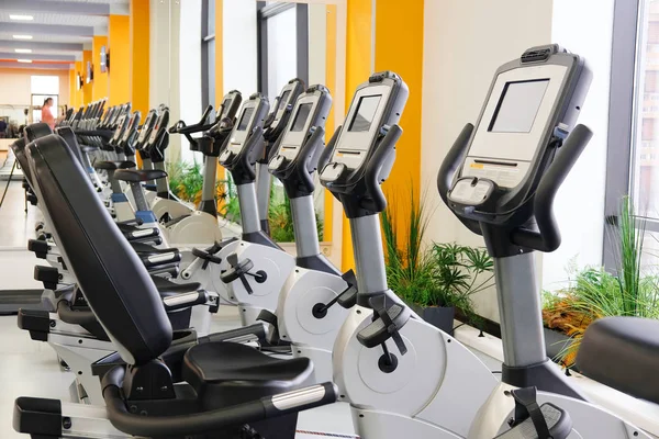 Fitness hall with sport bikes — Stock Photo, Image