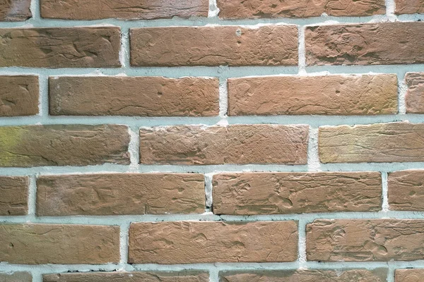 Fundo com a imagem de uma parede de tijolo — Fotografia de Stock