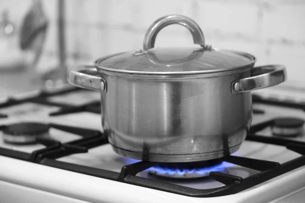 Old pot on a stove — Stock Photo, Image