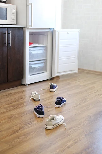 Comic picture with a made from shoes road to the refrigerator — Stock Photo, Image