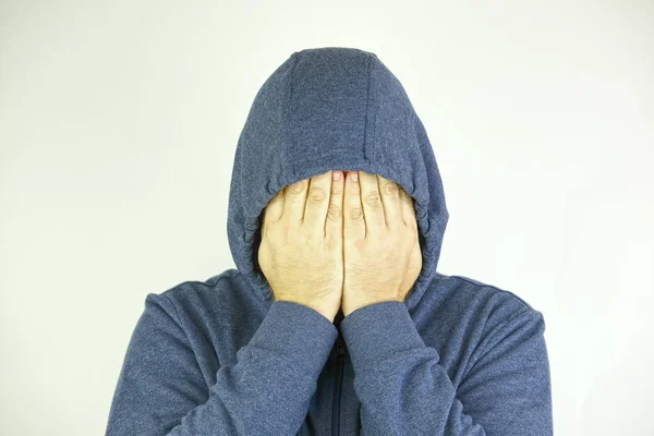 Man Jacket Hood Closes His Face Hands — Stock Photo, Image